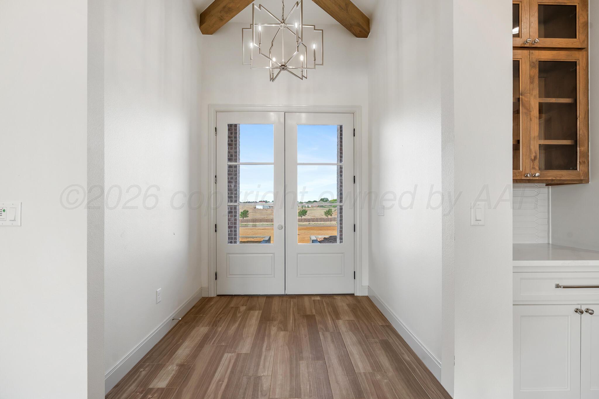 16551 Spring Lake Drive Canyon, TX 79015 - Photo 6 of 60 a view of an empty room with a window