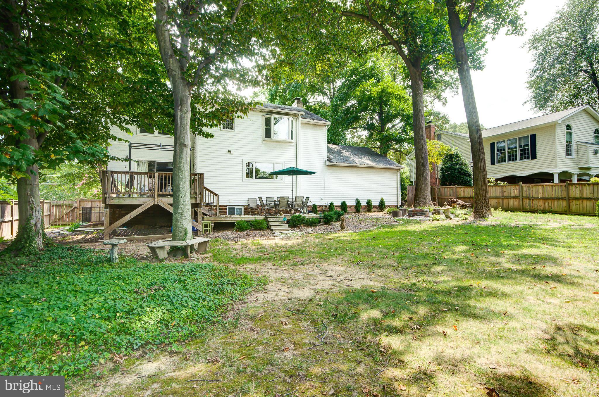 8402 Riverside Road Alexandria, VA 22308 - Photo 27 of 29 a view of a house with backyard porch and sitting area