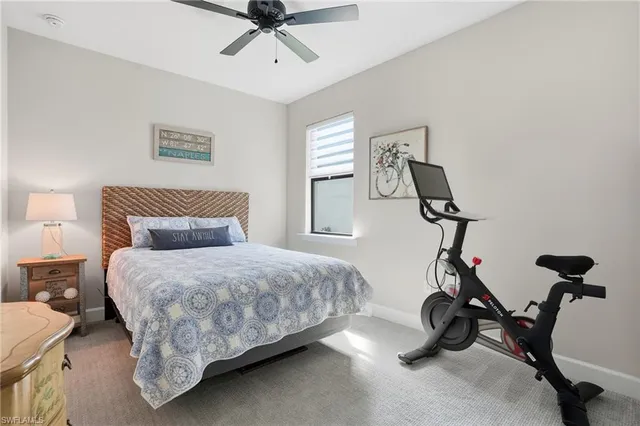 a bedroom with bed and a window