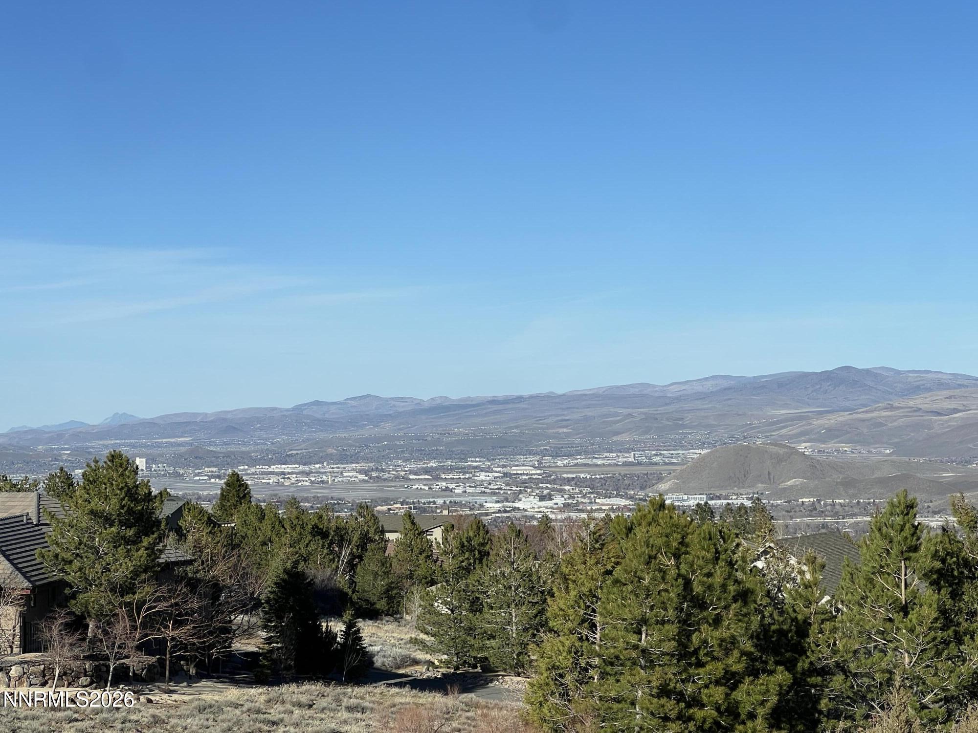 an aerial view of mountain with trees