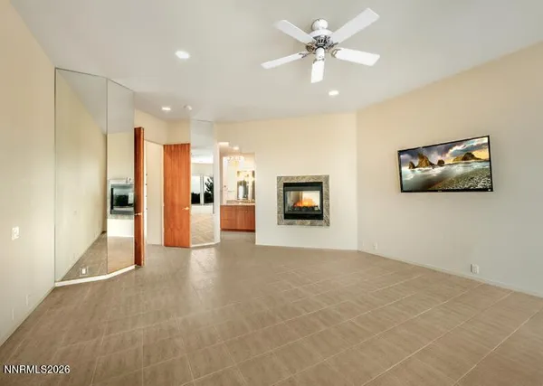 a view of a livingroom with a flat screen tv