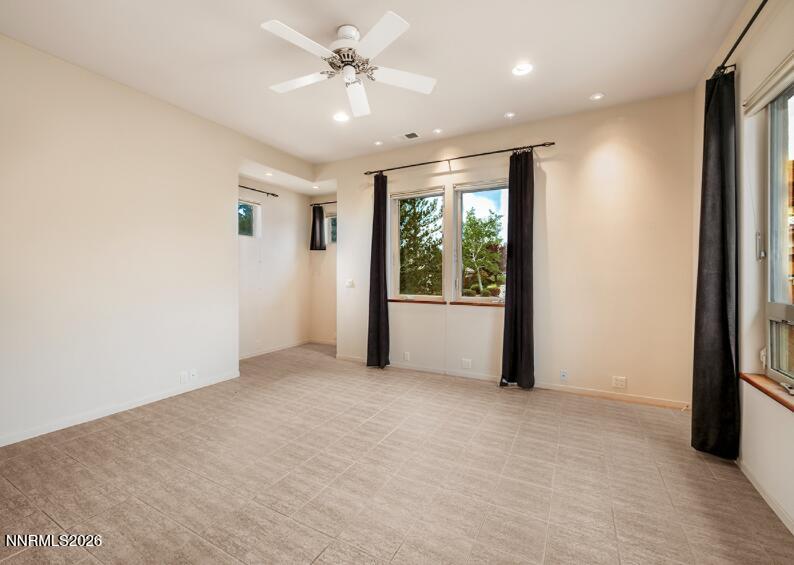 10123 Indian Ridge Drive Reno, NV 89511 - Photo 18 of 33 a view of an empty room with a window