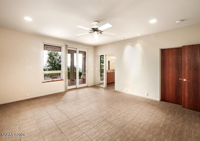 10123 Indian Ridge Drive Reno, NV 89511 - Photo 19 of 33 a view of an empty room with a window