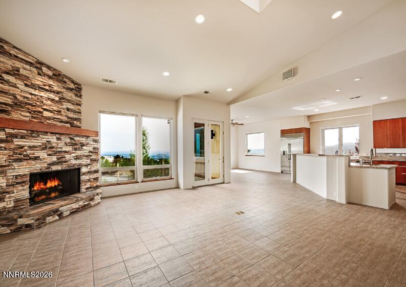 10123 Indian Ridge Drive Reno, NV 89511 - Photo 4 of 33 a view of a living room a fireplace and window