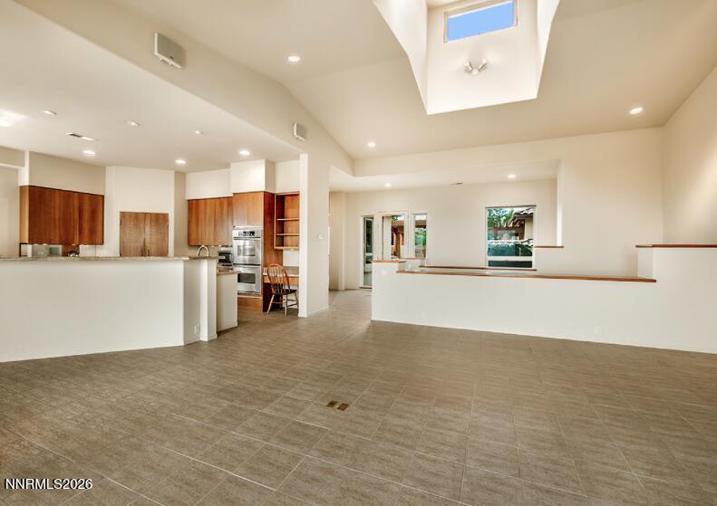10123 Indian Ridge Drive Reno, NV 89511 - Photo 6 of 33 a view of a kitchen with refrigerator and a sink