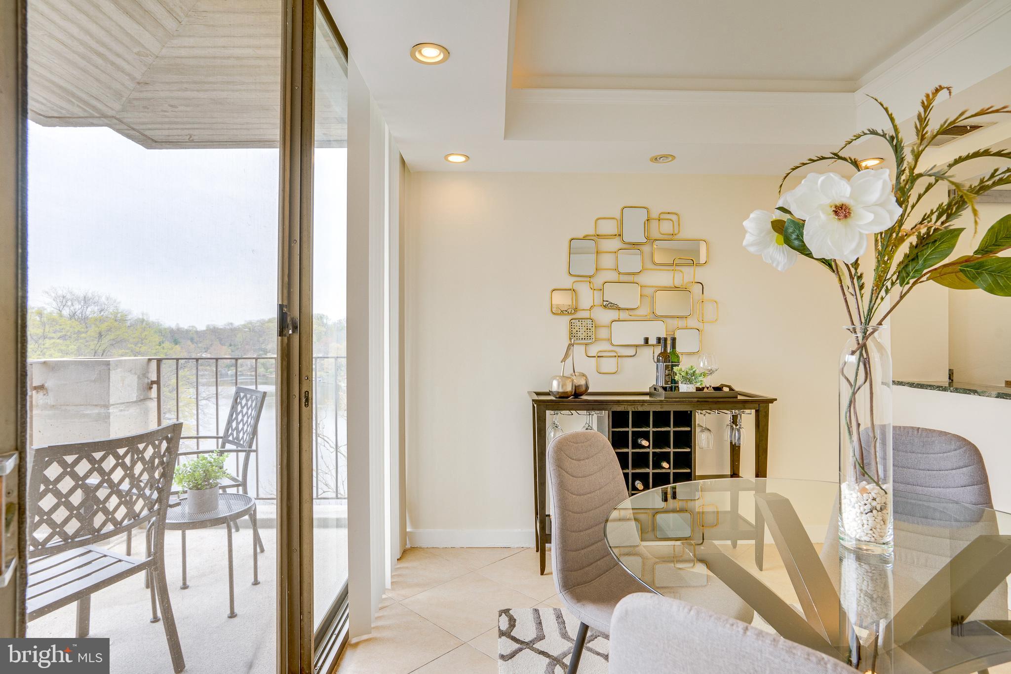 11400 Washington Plaza West, Unit 803 Reston, VA 20190 - Photo 20 of 43 a view of a dining room with furniture window and outside view