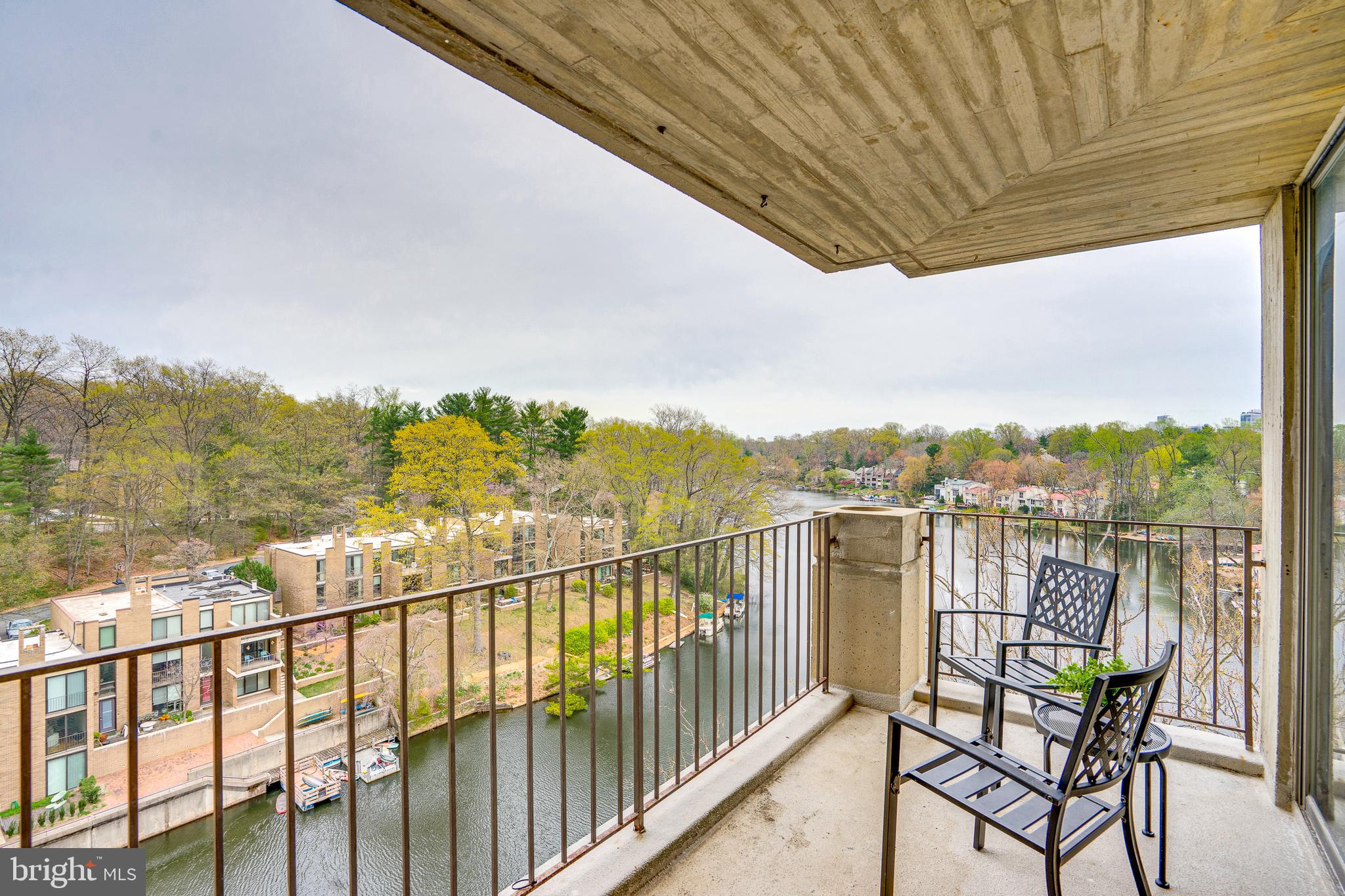 11400 Washington Plaza West, Unit 803 Reston, VA 20190 - Photo 23 of 43 a view of a city from a balcony with outdoor seating