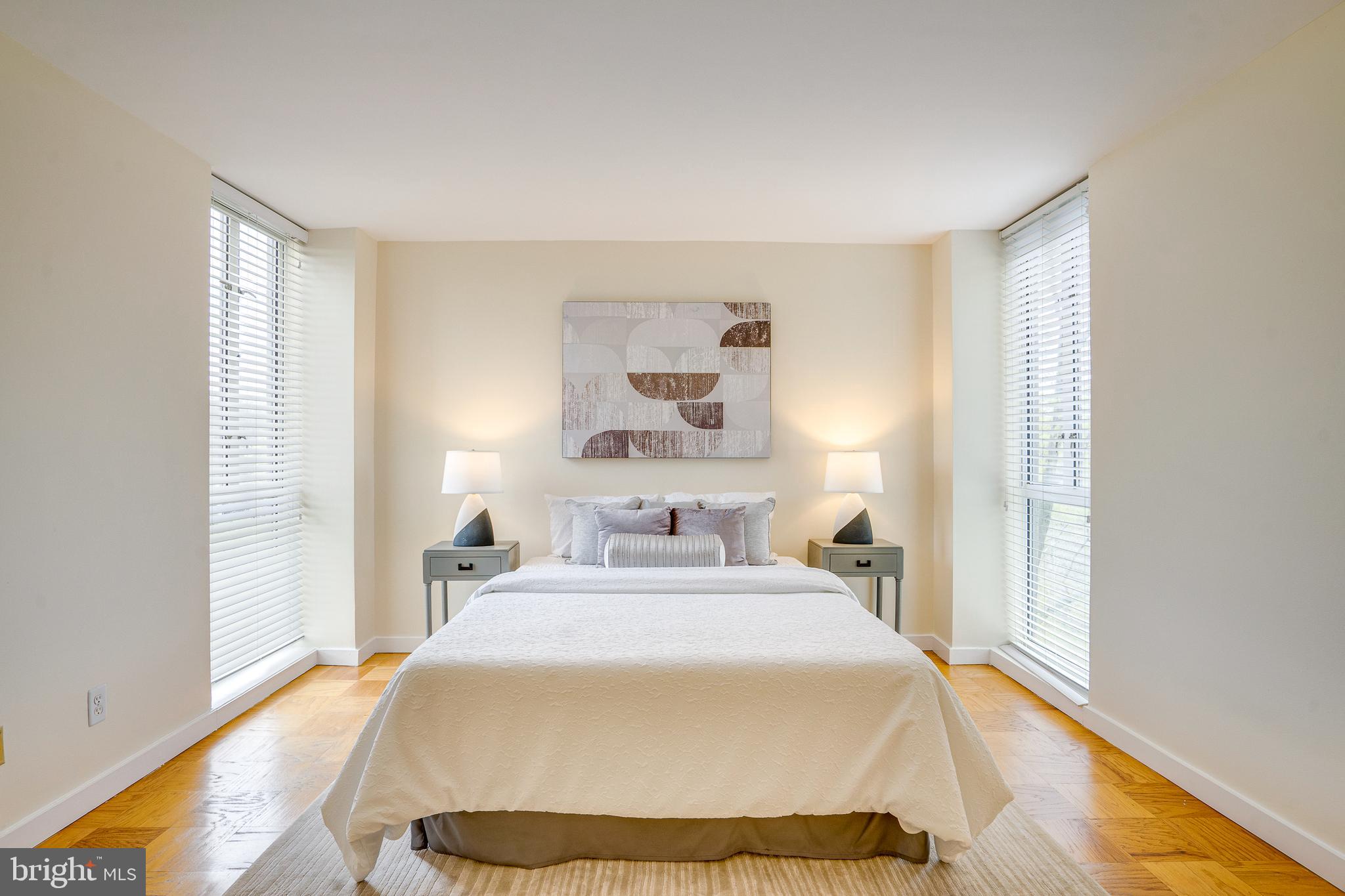 11400 Washington Plaza West, Unit 803 Reston, VA 20190 - Photo 33 of 43 a bedroom with a bed and a window