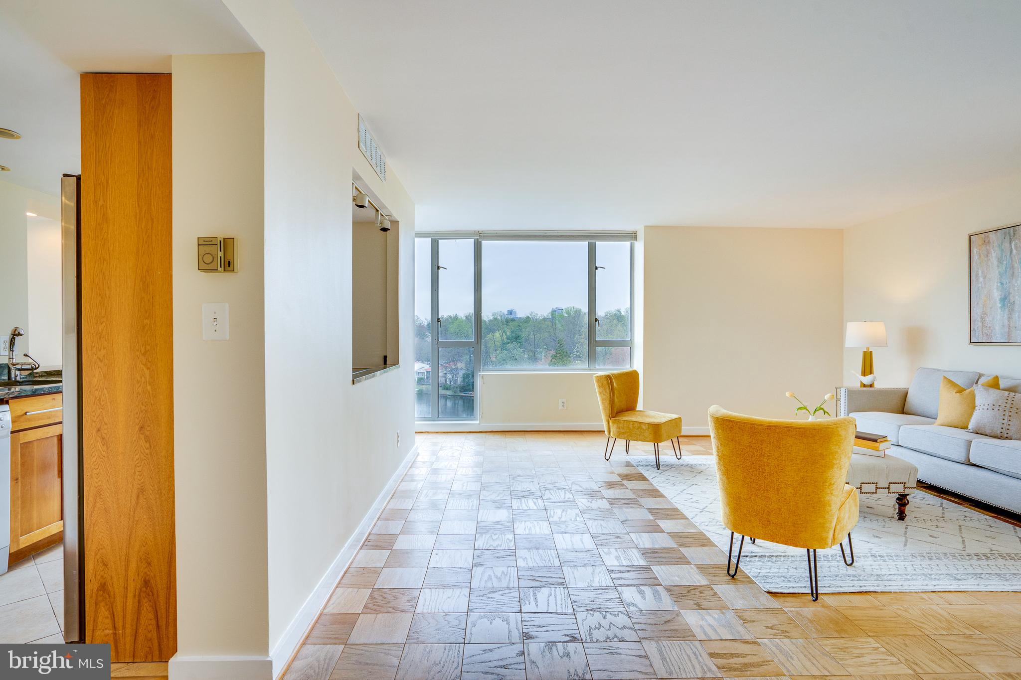 11400 Washington Plaza West, Unit 803 Reston, VA 20190 - Photo 4 of 43 a living room with a large window