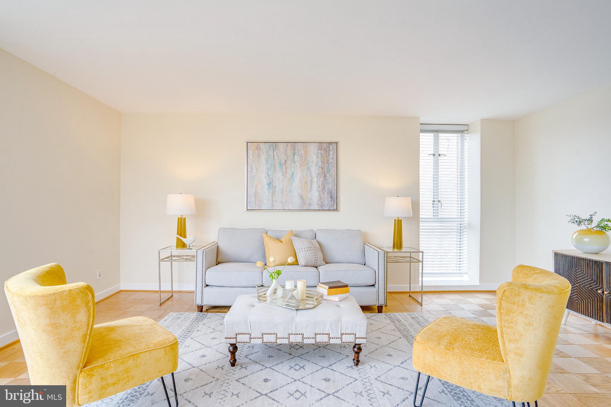 11400 Washington Plaza West, Unit 803 Reston, VA 20190 - Photo 7 of 43 a living room with furniture and a lamp