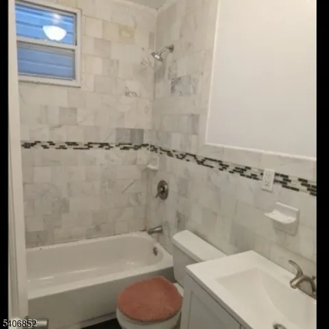 a bathroom with a sink and a bathtub