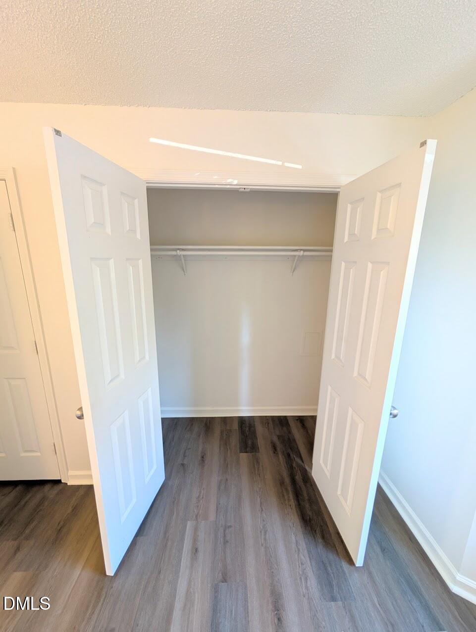 2020 Quaker Landing, Unit 103 Raleigh, NC 27603 - Photo 11 of 19 a view of wooden floor in a room