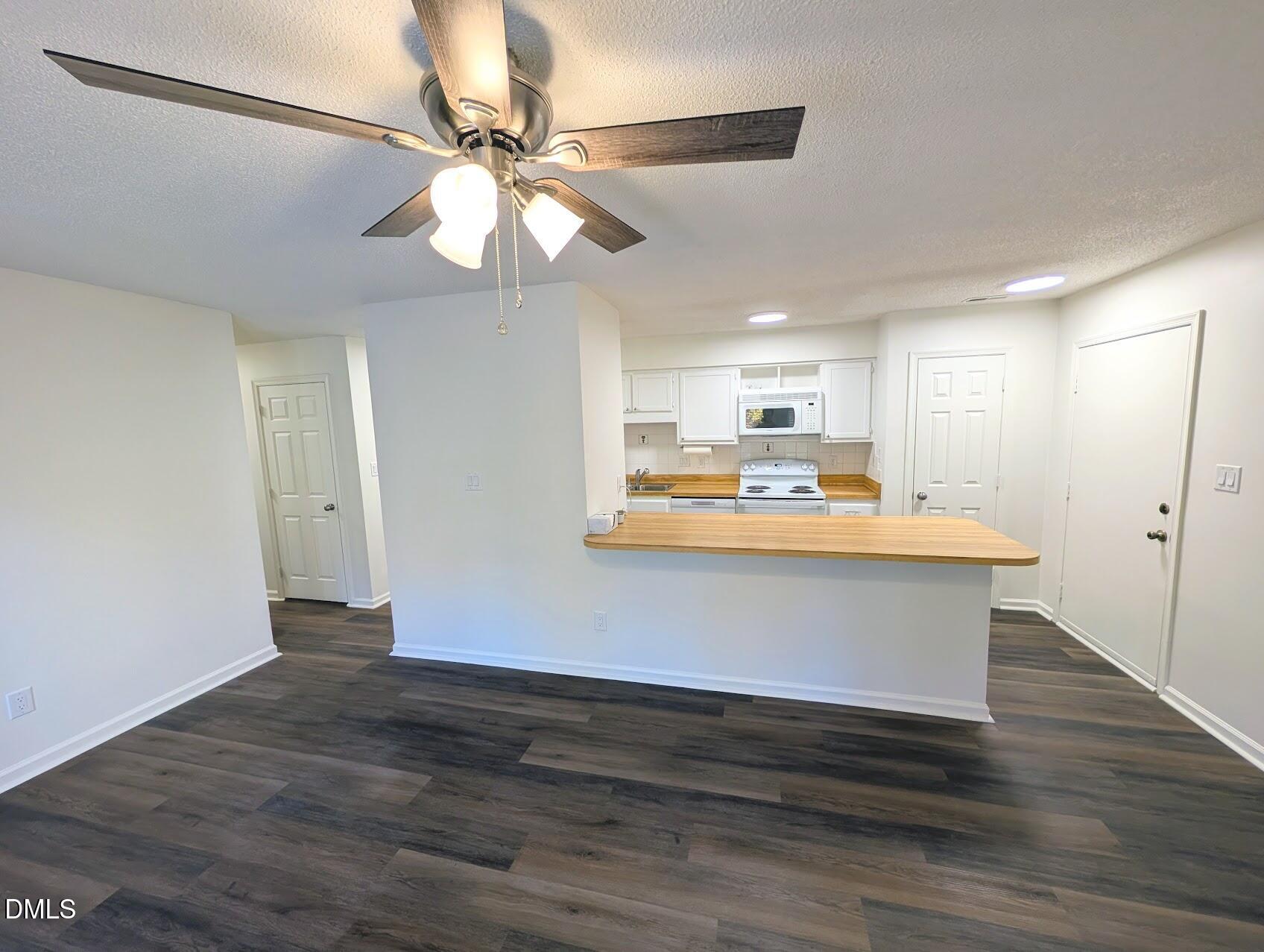 2020 Quaker Landing, Unit 103 Raleigh, NC 27603 - Photo 3 of 19 a view interior of the house and kitchen view