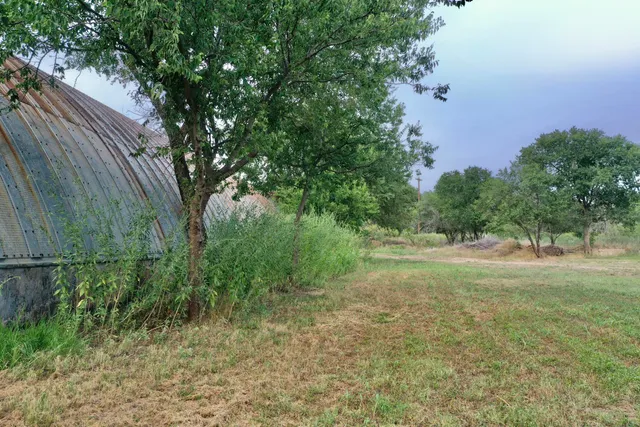 a view of outdoor space and yard