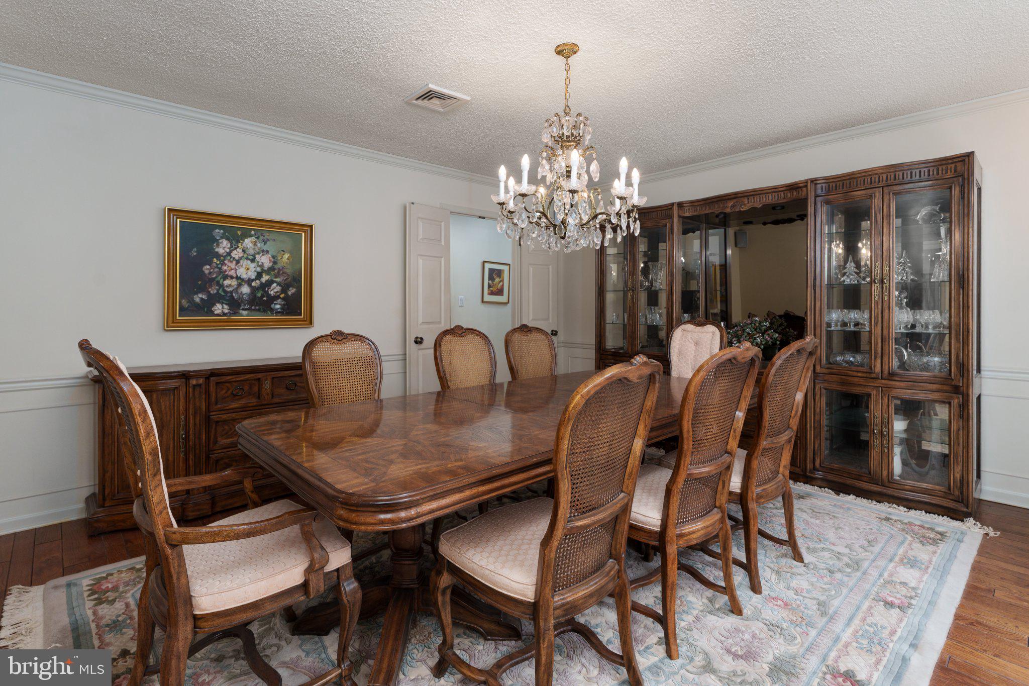 338 Gallup Road Princeton, NJ 08540 - Photo 12 of 53 a view of a dining room with furniture and chandelier