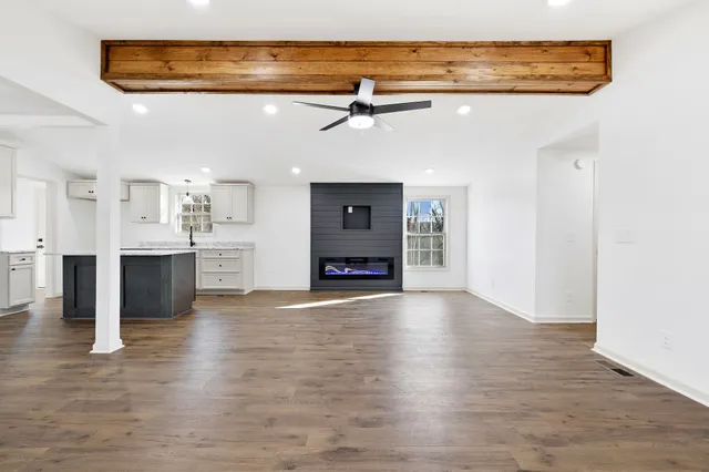 a kitchen with a sink stainless steel appliances and cabinets