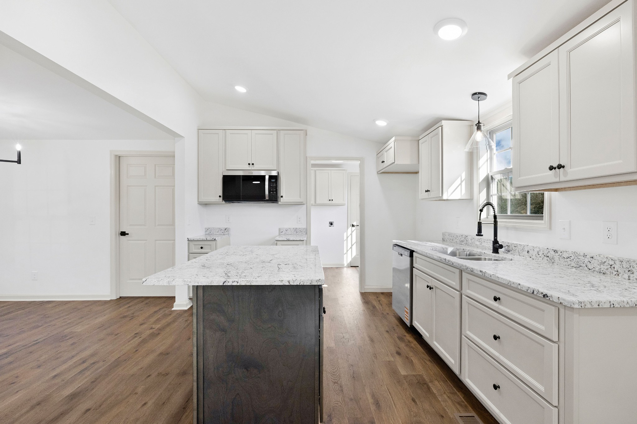 462 Circle Drive Prospect, TN 38477 - Photo 6 of 29 a large white kitchen with stainless steel appliances granite countertop a lot of counter space and wooden floors