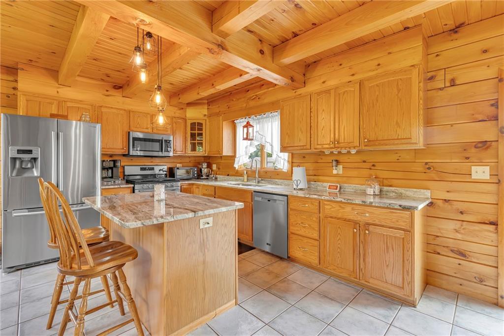 303 Sharon Grange Road Aliquippa, PA 15001 - Photo 12 of 50 Talk about a true log home. Just beautiful!