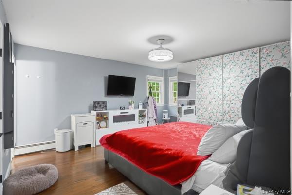 31 Laura Road Monroe, NY 10950 - Photo 22 of 39 a bedroom with a bed and a flat screen tv