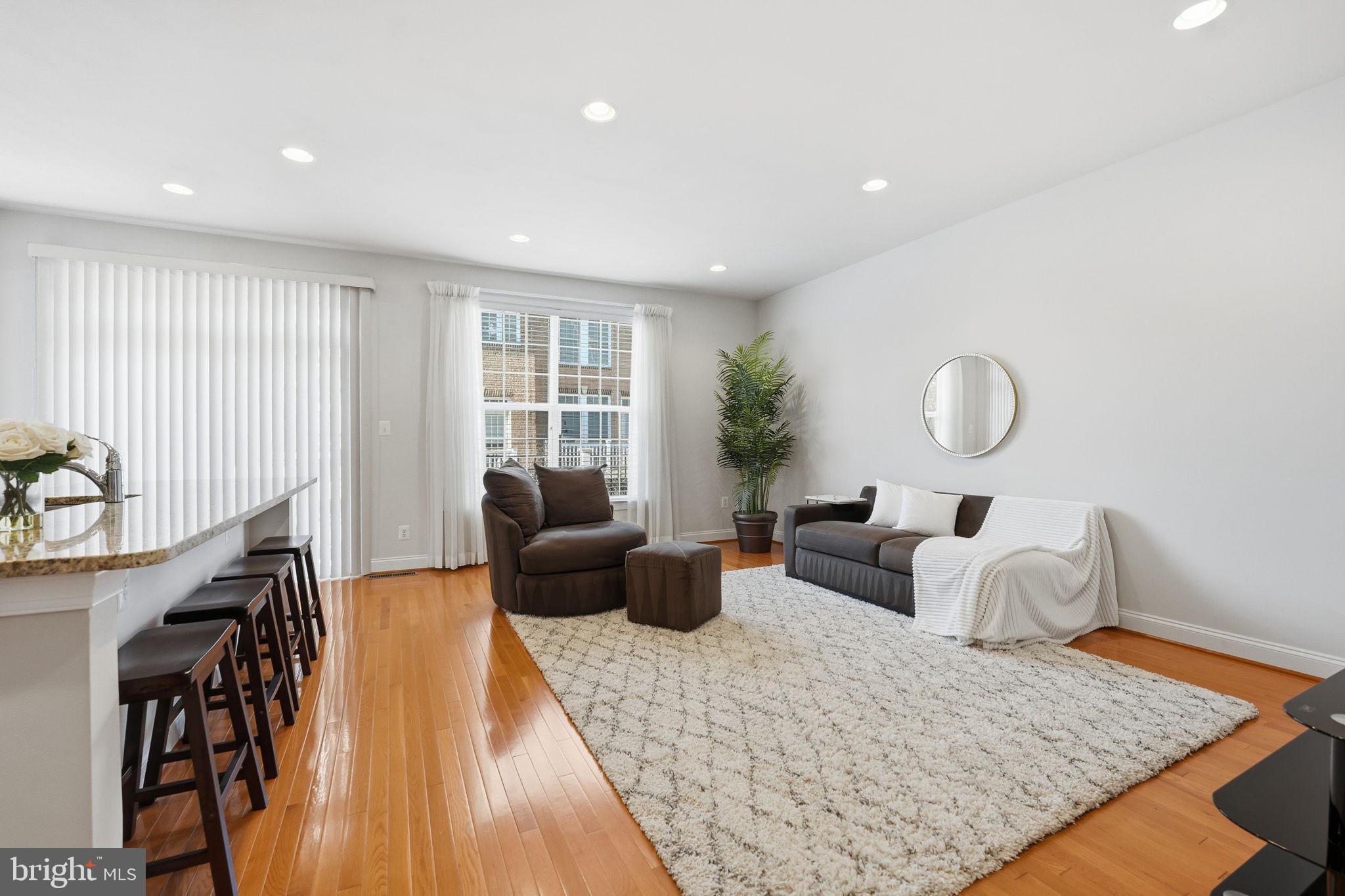8015 Reserve Way Vienna, VA 22182 - Photo 14 of 58 a living room with furniture rug and window