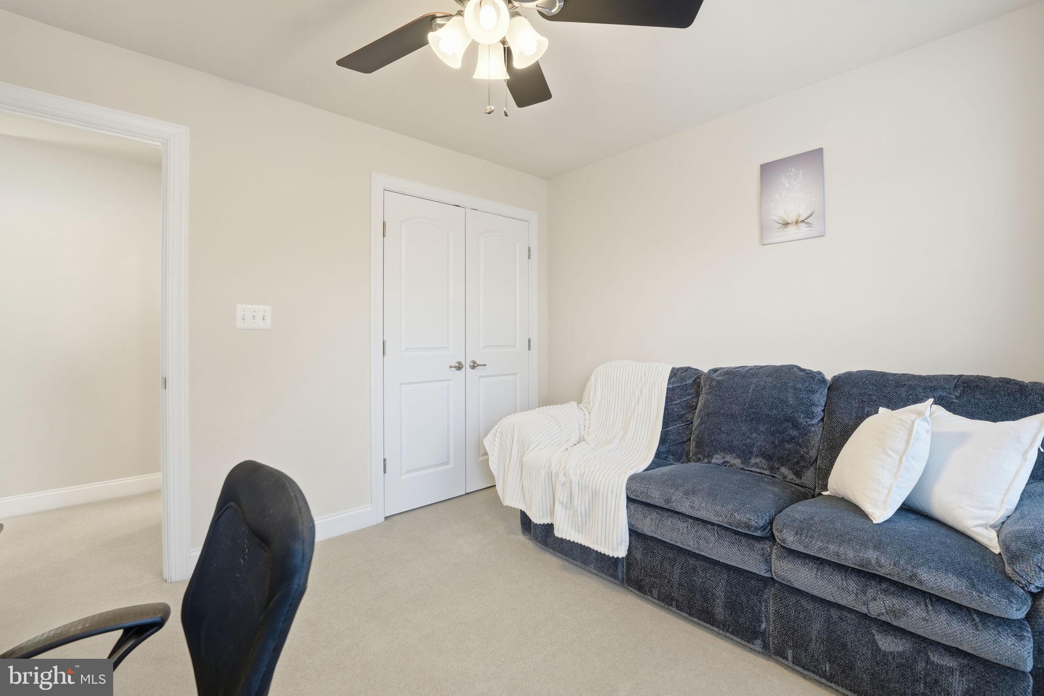 8015 Reserve Way Vienna, VA 22182 - Photo 32 of 58 a living room with furniture