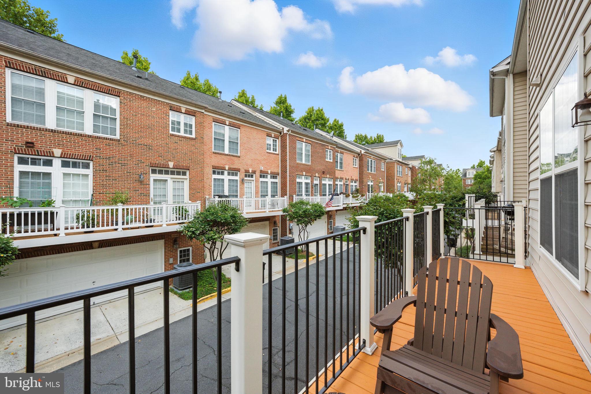 8015 Reserve Way Vienna, VA 22182 - Photo 39 of 58 a view of a brick building from a balcony