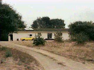 1403 Schaeffer Road Sebastopol, CA 95472 - Photo 1 of 1 a view of a house with backyard and sitting area