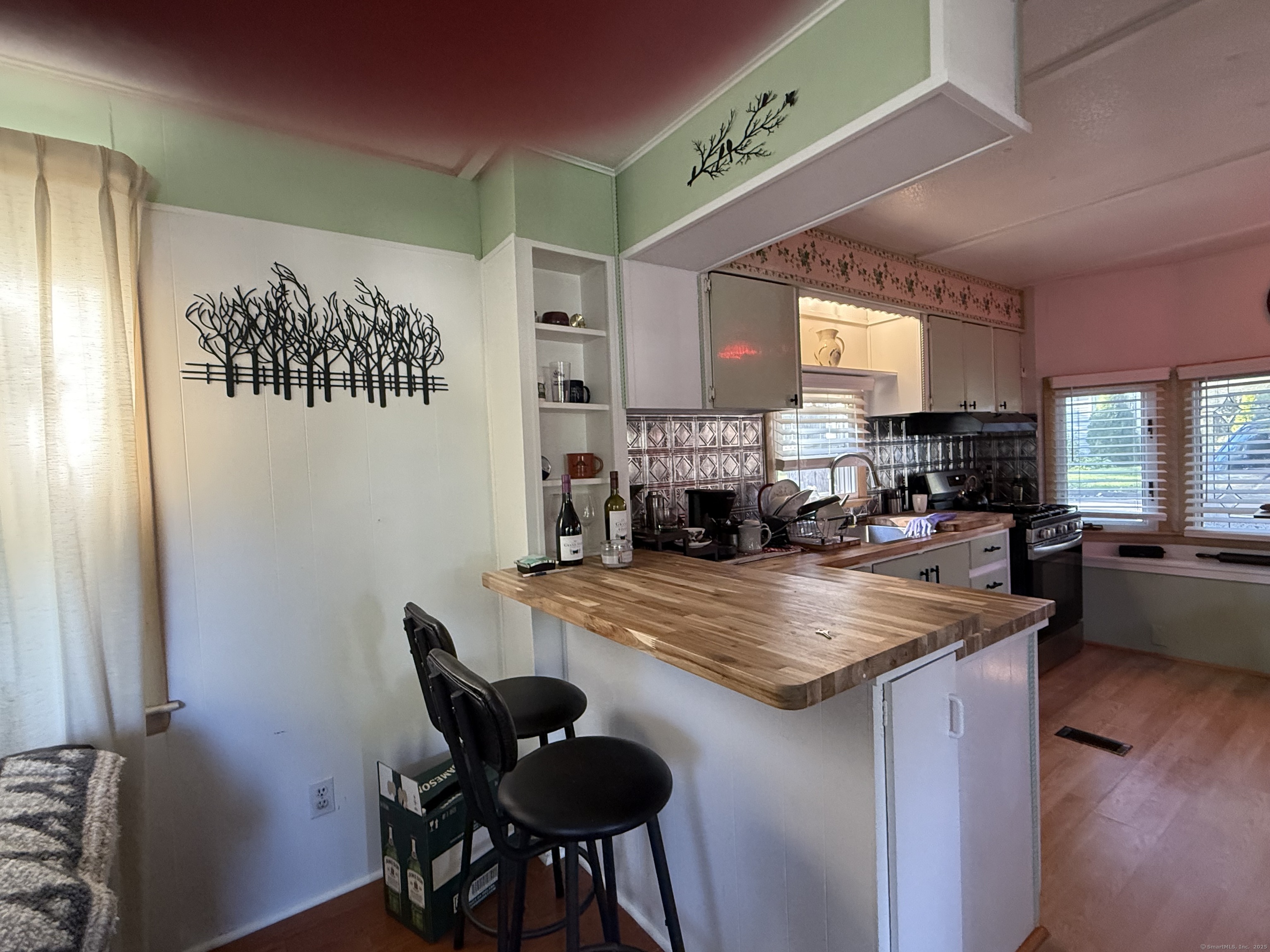 10 Whitewood Road Killingworth, CT 06419 - Photo 2 of 12 a view of kitchen and dining area with furniture