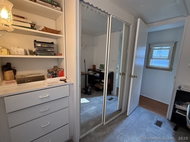 10 Whitewood Road Killingworth, CT 06419 - Photo 9 of 12 a room with storage and utility