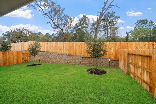 a front view of a house with yard