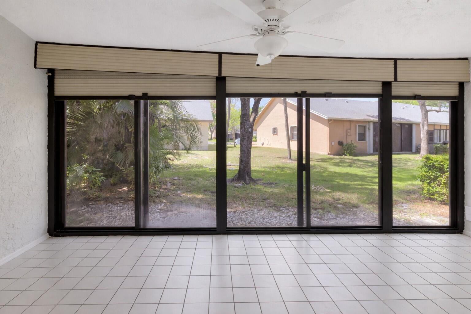 10884 Waterberry Court Boca Raton, FL 33498 - Photo 15 of 39 a view of an empty room with window