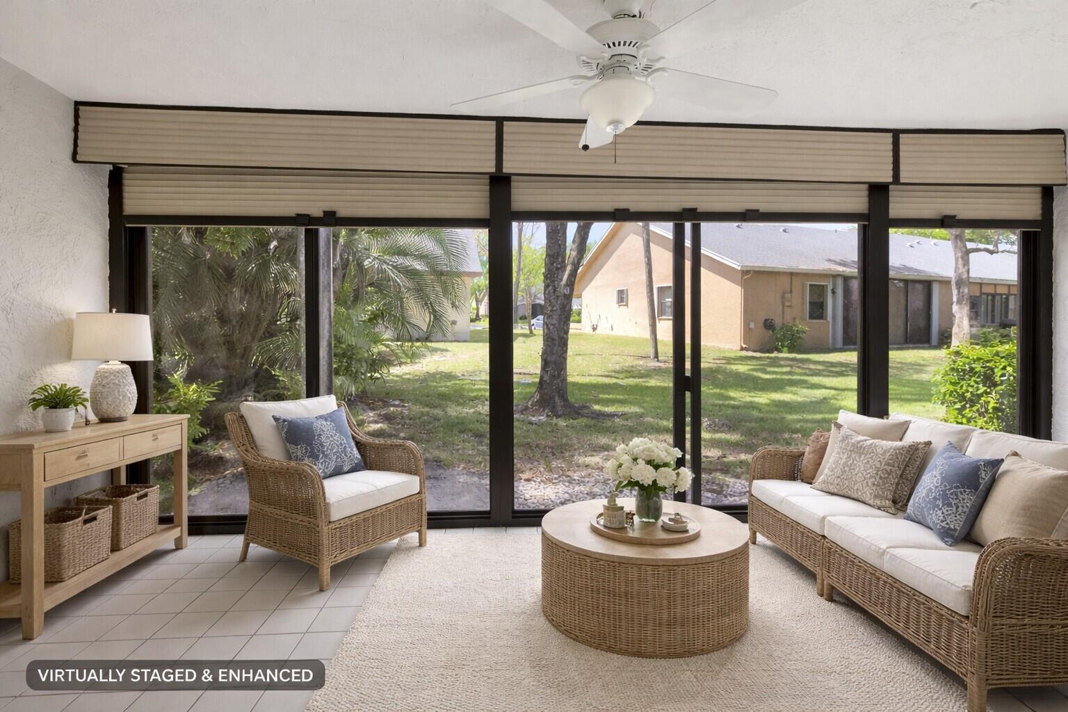 10884 Waterberry Court Boca Raton, FL 33498 - Photo 17 of 39 a living room with furniture and a large window