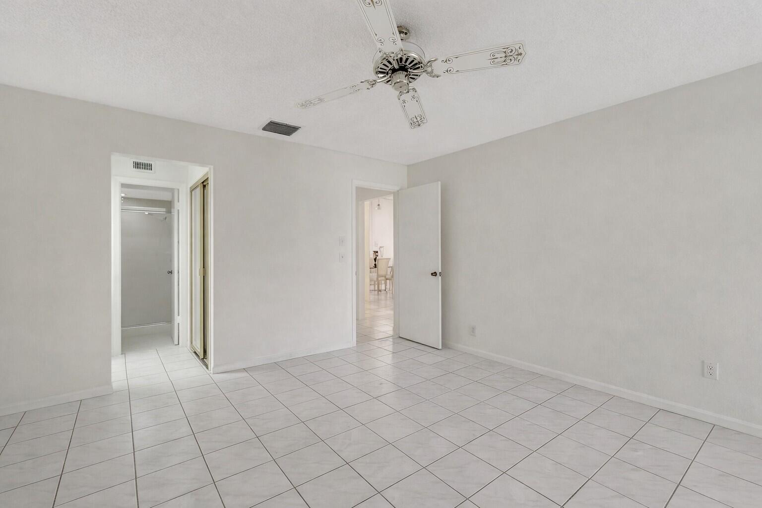10884 Waterberry Court Boca Raton, FL 33498 - Photo 19 of 39 a view of an empty room