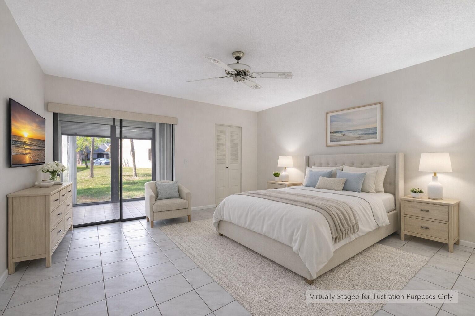 10884 Waterberry Court Boca Raton, FL 33498 - Photo 22 of 39 a spacious bedroom with a bed and glass windows
