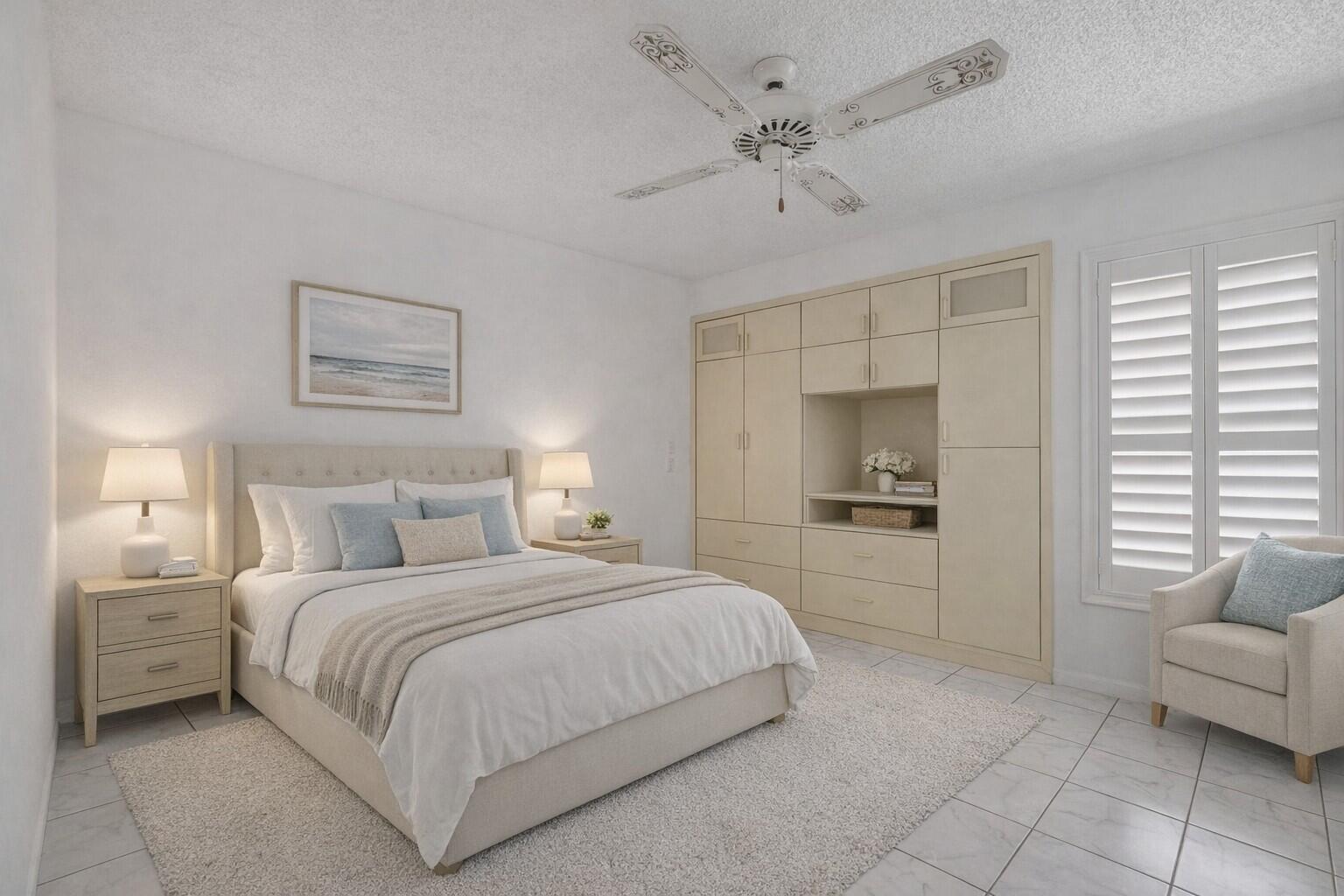 10884 Waterberry Court Boca Raton, FL 33498 - Photo 26 of 39 a bedroom with a bed and a couch