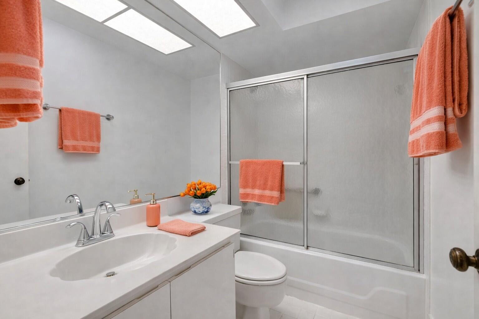 10884 Waterberry Court Boca Raton, FL 33498 - Photo 27 of 39 a bathroom with a sink toilet and shower
