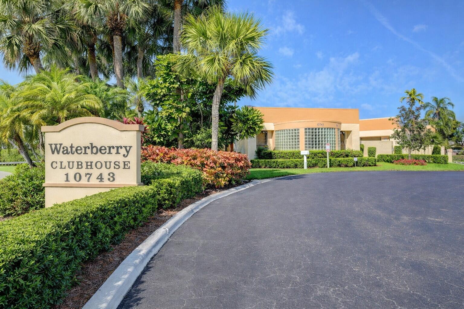 10884 Waterberry Court Boca Raton, FL 33498 - Photo 28 of 39 a sign on the side of a building