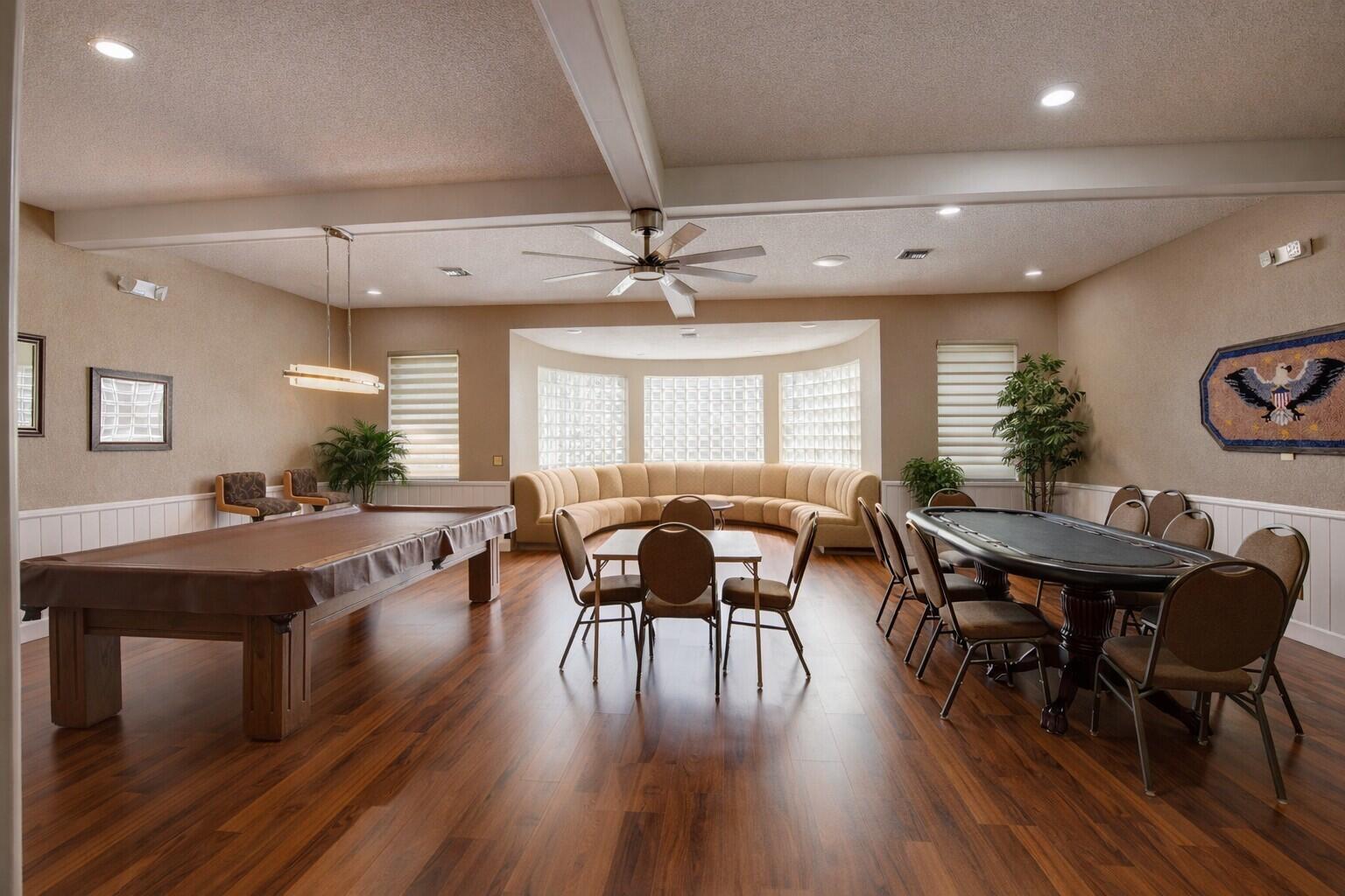 10884 Waterberry Court Boca Raton, FL 33498 - Photo 31 of 39 a view of a dining room with furniture window and wooden floor