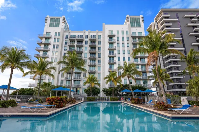 a view of water with tall building