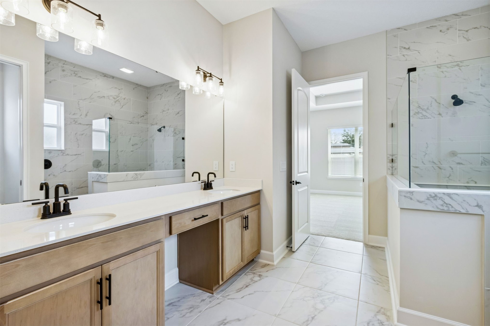 85228 Sandy Rdg Loop Yulee, FL 32097 - Photo 14 of 24 a bathroom with a granite countertop sink and a mirror