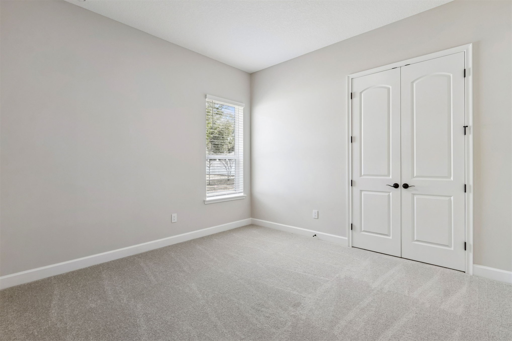 85228 Sandy Rdg Loop Yulee, FL 32097 - Photo 20 of 24 a view of an empty room with a window