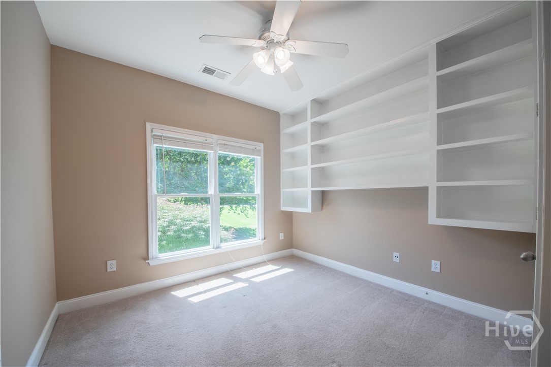 217 Hidden Spring Way Athens, GA 30605 - Photo 23 of 55 Bedroom 2 with Built-In Shelving