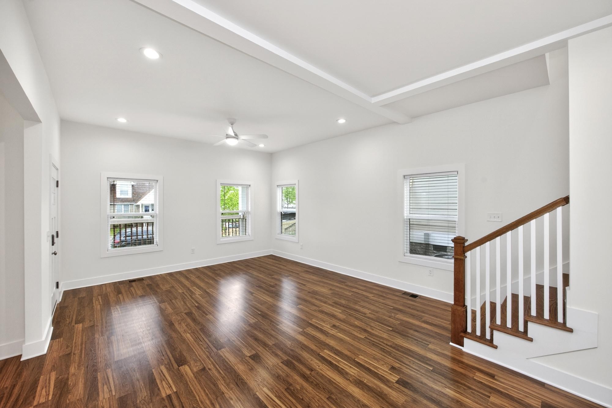 7 Decatur Street Nashville, TN 37210 - Photo 11 of 43 an empty room with wooden floor and windows
