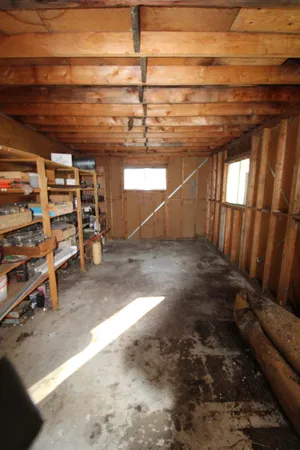 a view of a garage with storage