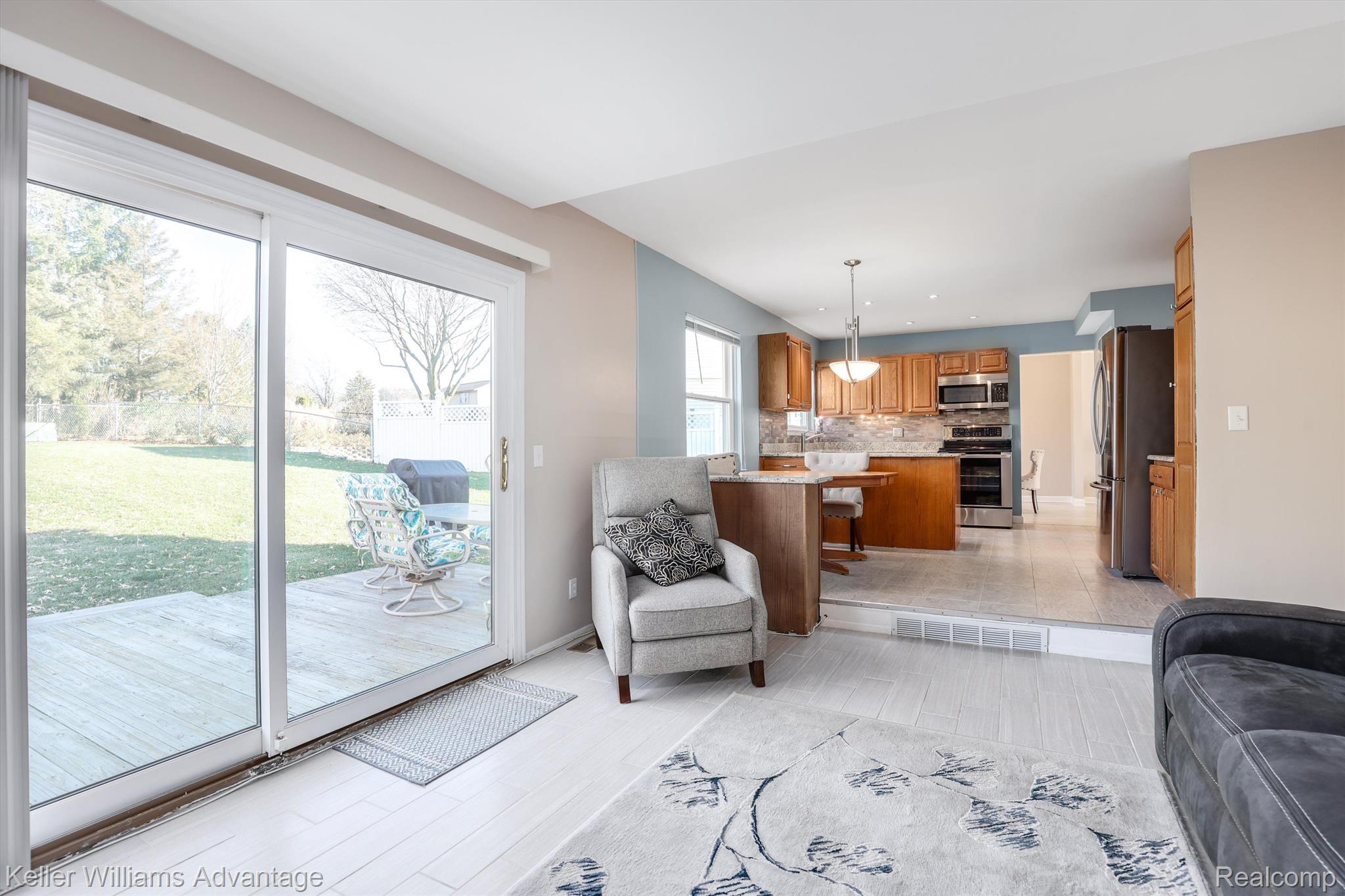 42448 Park Ridge Road Novi, MI 48375 - Photo 8 of 26 Family room has sliding door to back deck