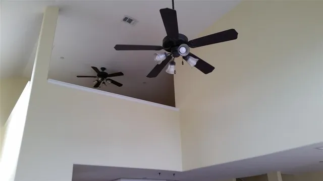 a view of a room with a fan