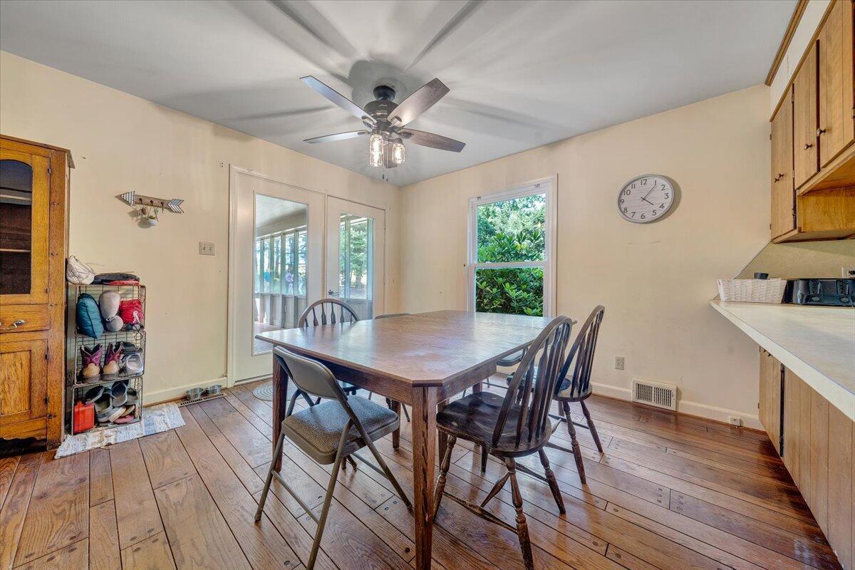 404 Robin Ridge Road Rocky Mount, VA 24151 - Photo 18 of 56 a view of a dining room with furniture window and wooden floor