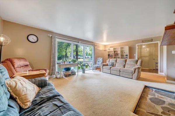 a view of an empty room with racks on the wall