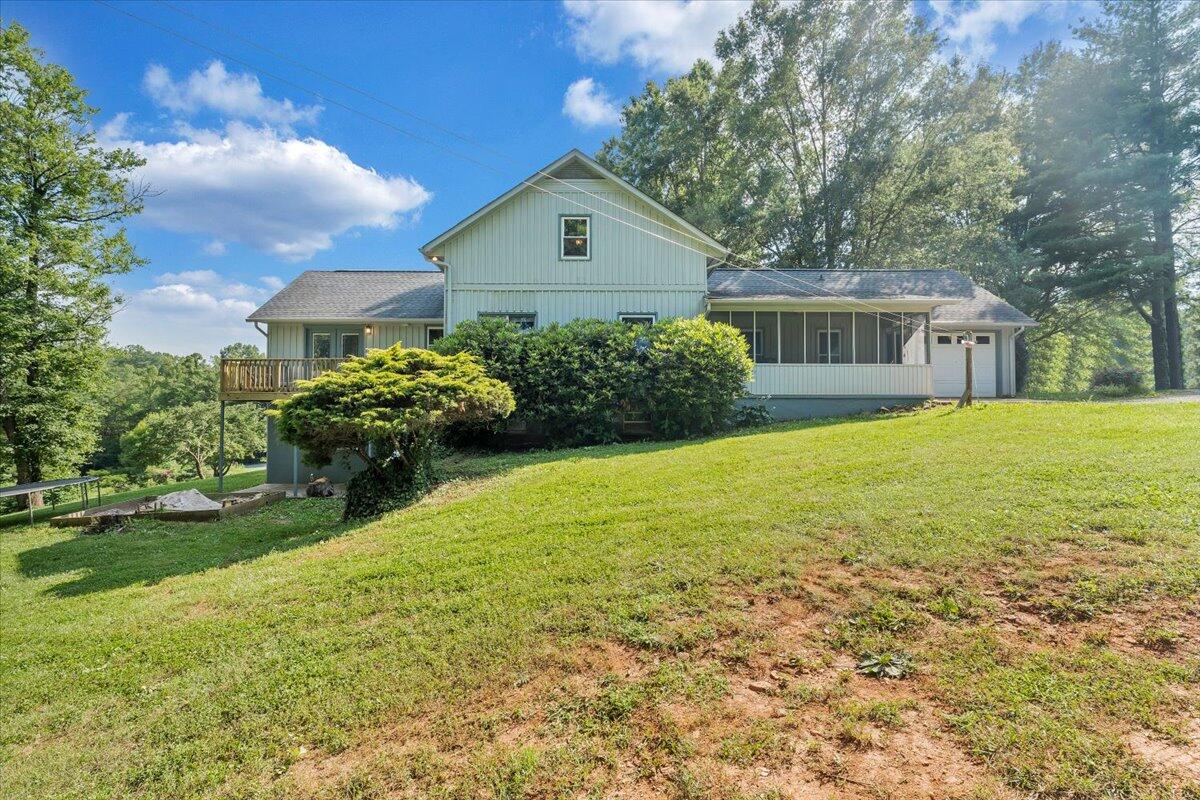 404 Robin Ridge Road Rocky Mount, VA 24151 - Photo 46 of 56 a front view of house with yard and green space