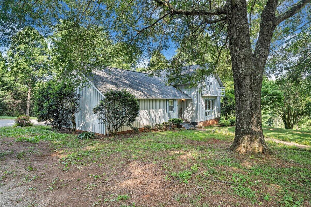 404 Robin Ridge Road Rocky Mount, VA 24151 - Photo 51 of 56 a view of a house with a yard